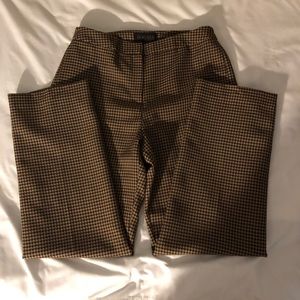 Blacker. Brown and a little darker camel tan